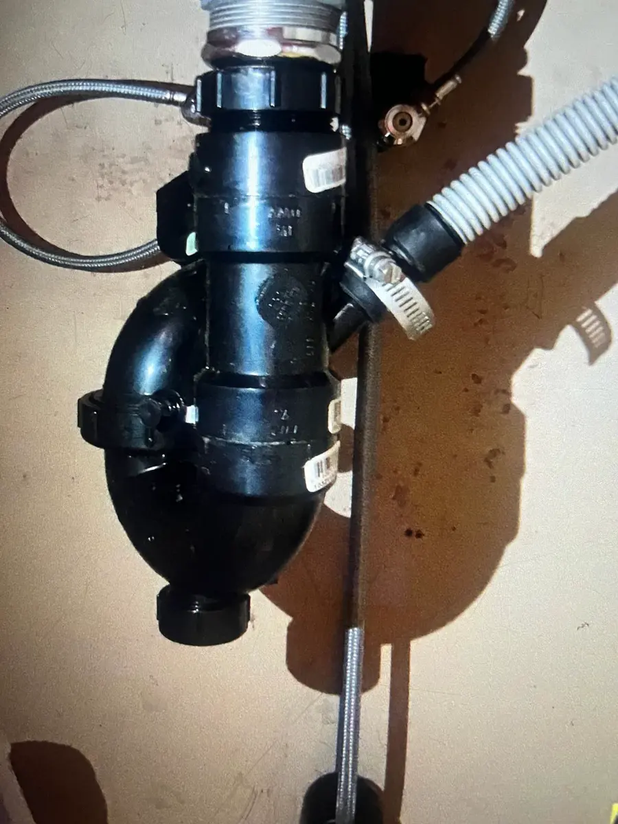 Under-sink garbage disposal plumbing installation